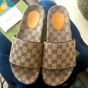 Brown barely worn Gucci slides size 10 women